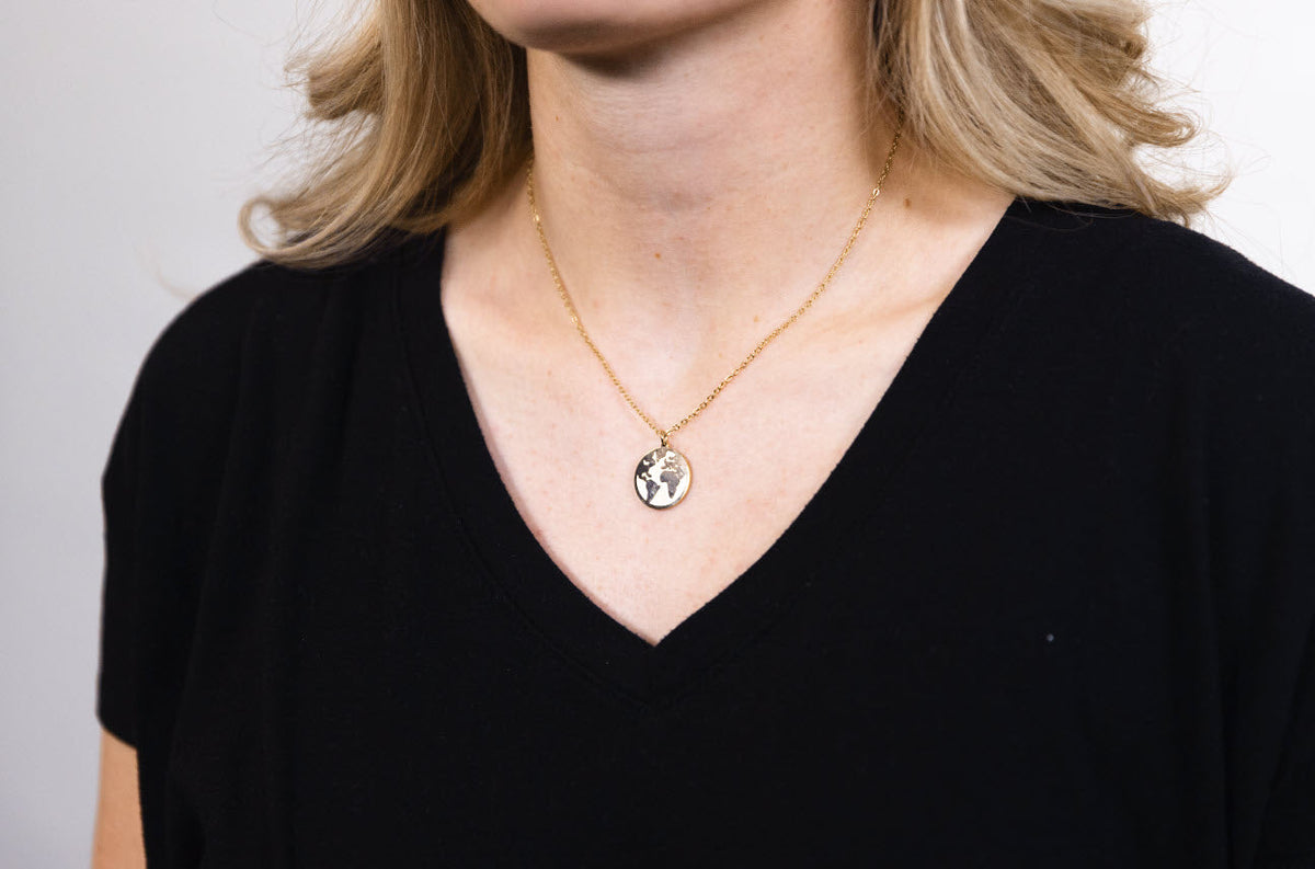 Globe Charm Gold Necklace Made by Trafficking Survivors | Our