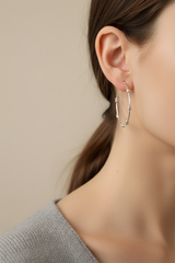 Knots of Freedom Hoops