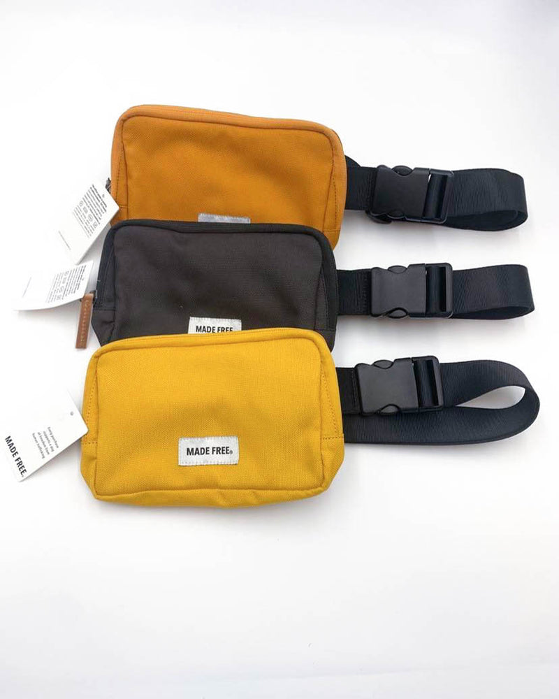 orange black and yellow fanny pack