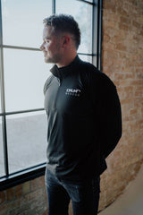 black embroidered our rescue long sleeve quarter zip