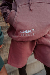 close up o.u.r rescue white embroidery hoodie pocket