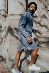 male model blue fleece hoodie and short set
