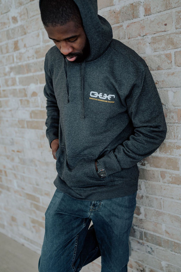 male model grey hooded sweatshirt o.u.r logo 