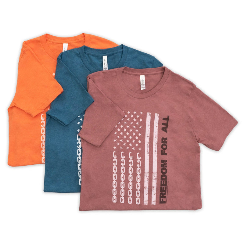 orange blue pink freedom for all tee flatlay