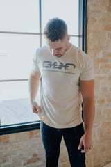 male model tan short sleeve tee shirt o.u.r logo large