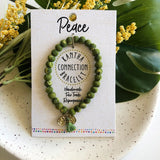 fabric covered green beaded bracelet