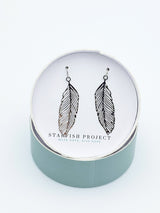 silver feather dangle earrings